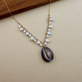 Moonlit Cowrie Necklace
